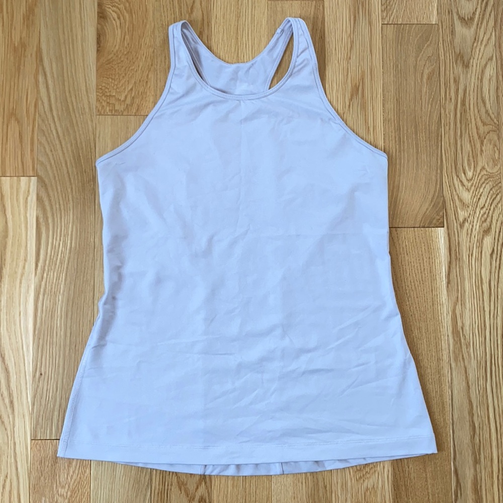 Under Armor workout tank top size large in lilac. High neck line.
